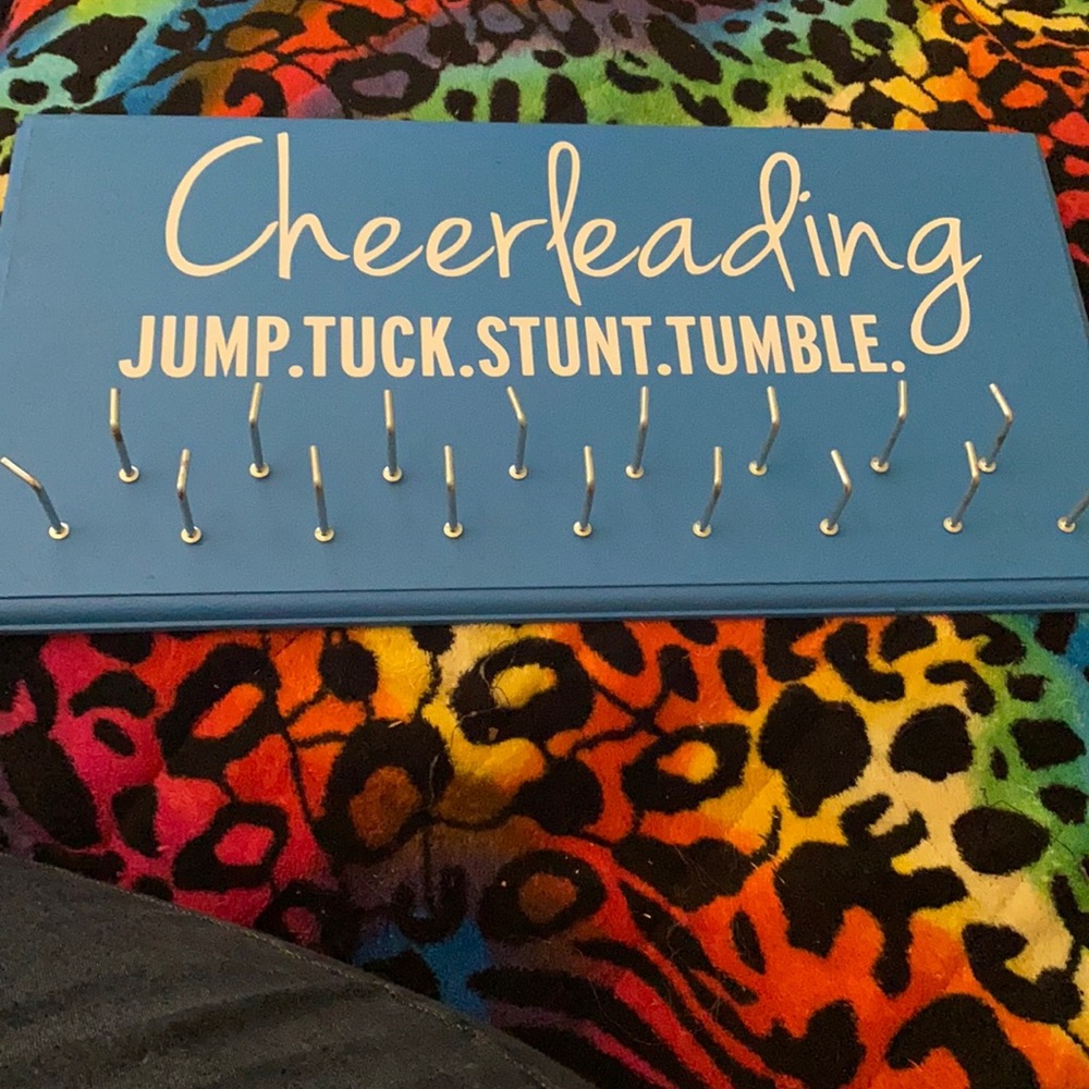 Cheerleading medal holder